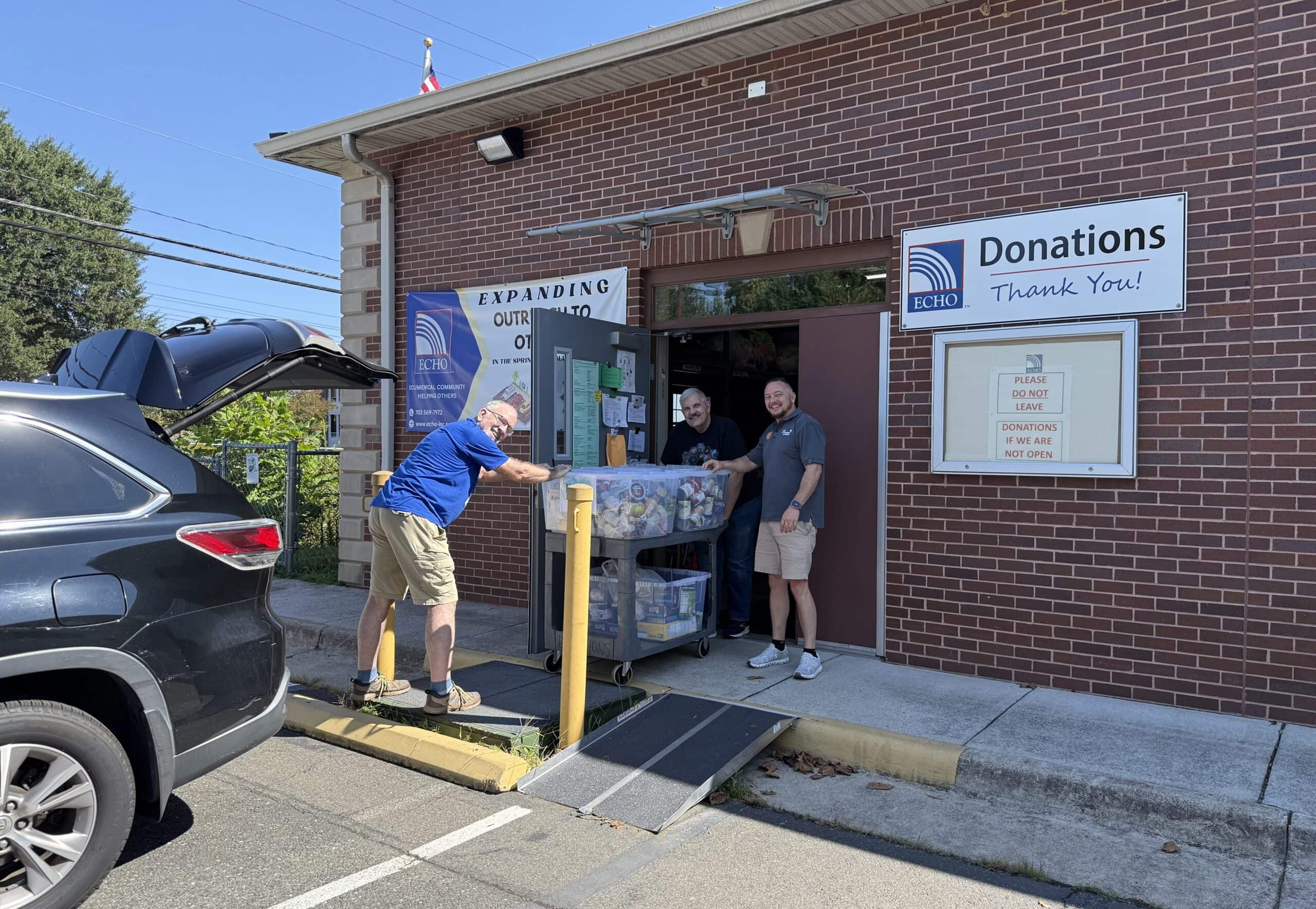 donations being dropped off with volunteers